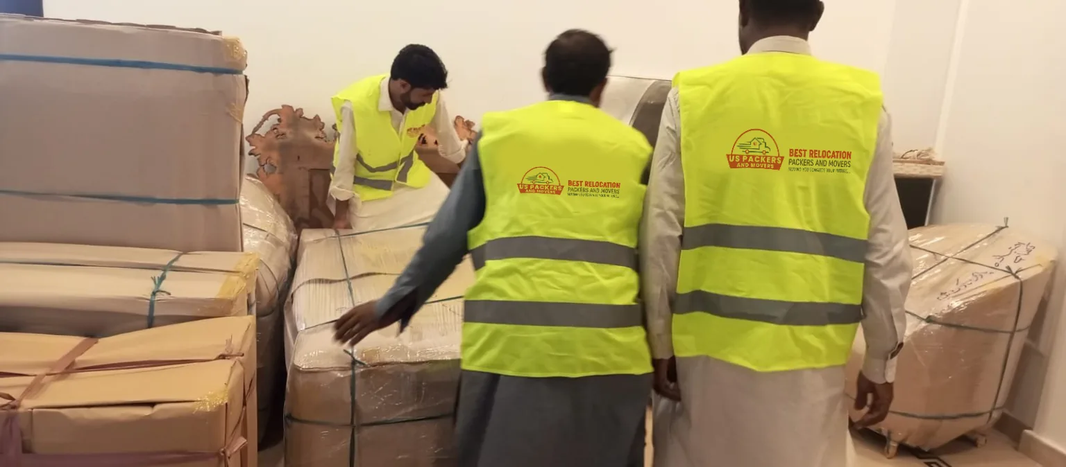US Packers and Movers crew packing a house in Islamabad