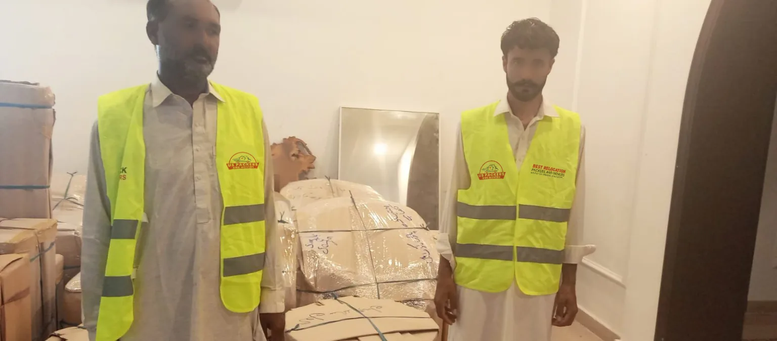 US Packers and Movers crew with packed household goods in Islamabad